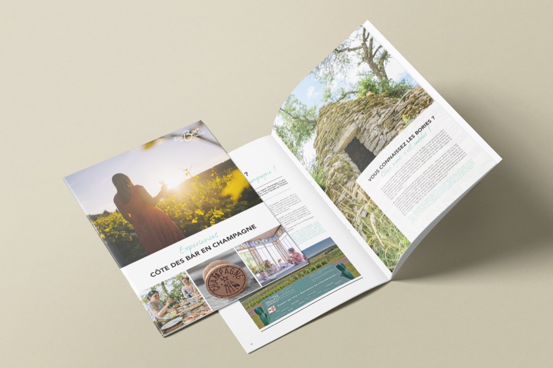 Le guide touristique Côte des Bar en Champagne 2023-2024, ouvert sur une double page.