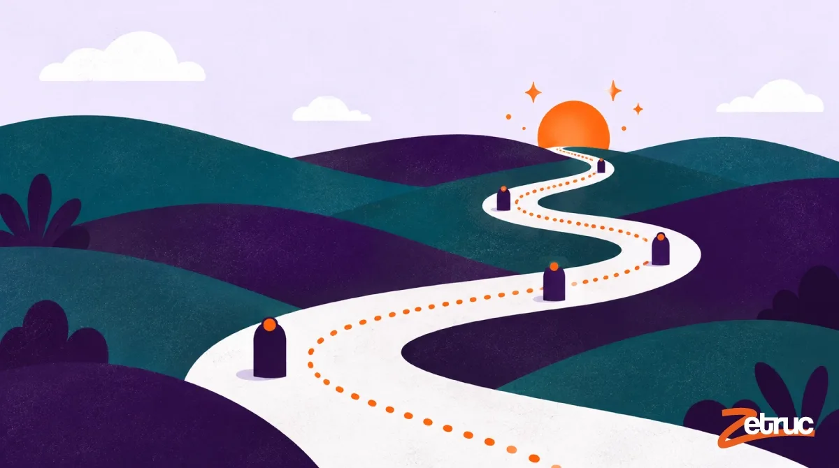 Une route sinueuse jalonnée de bornes, qui mène à un soleil levant à l’horizon